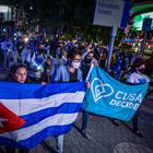 USA6049. MIAMI (UNITED STATES), 12/10/2020.- Some people leave in procession to a Catholic church today, at the end of an act of support for the San Isidro de Cuba Movement held in front of the Freedom Tower in Miami, Florida ( USA.). "San Isidro we are all" Y "the tyranny is in check" were the most chanted slogans in an act in support of the movement of Cuban opposition artists that "they have lit the flame of freedom" in Cuba celebrated this Thursday in Miami on the occasion of International Human Rights Day. EFE / Giorgio Viera