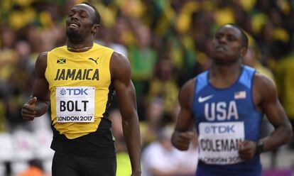 Bolt y Coleman, tras la semifinal de 100m ganada por el norteamericano.