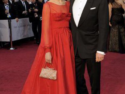 Livia Giuggioli y Colin Firth, en la alfombra roja.