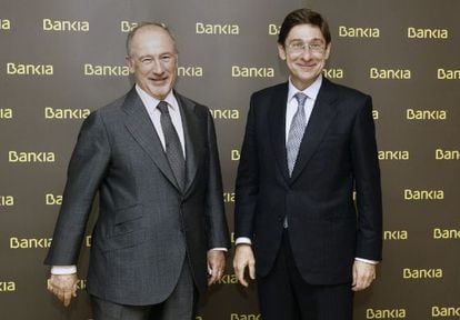 El expresidente de Bankia, Rodrigo Rato junto al actual presidente José  Ignacio Goirigolzarri.