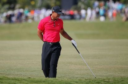 Tiger se duele en el pasado Cadillac Championship.