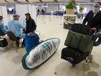 Travellers sit for the Covid test at Israel's Ben Gurion Airport near Tel Aviv on March 8, 2021, upon their arrival from New York. (Photo by JACK GUEZ / AFP)