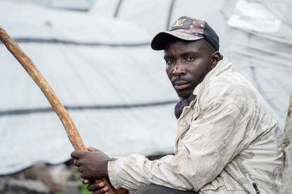 Vincent Ndahayo, father of six, poses in front of his tent.  In his city he raised cows and made cheese, now he does not know what will become of him and his family. "We need urgent help, especially in terms of security, food and health,” he insists.