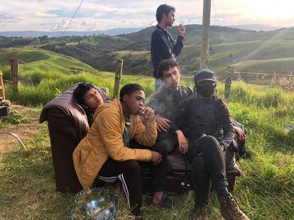 The protagonists of Laura Mora's feature film have finished eating and are relaxing in the Santa Rosa de Osos Mountains north of Antioquia, Colombia.