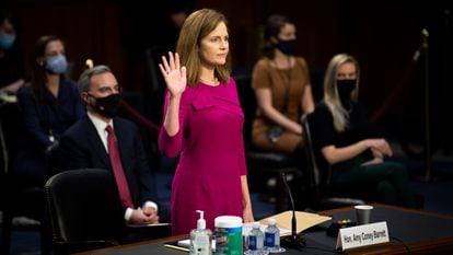 Supreme Court nominee Amy Coney Barrett is sworn in during a confirmation hearing before the Senate Judiciary Committee, Monday, Oct. 12, 2020, on Capitol Hill in Washington. (Caroline Brehman/Pool via AP)