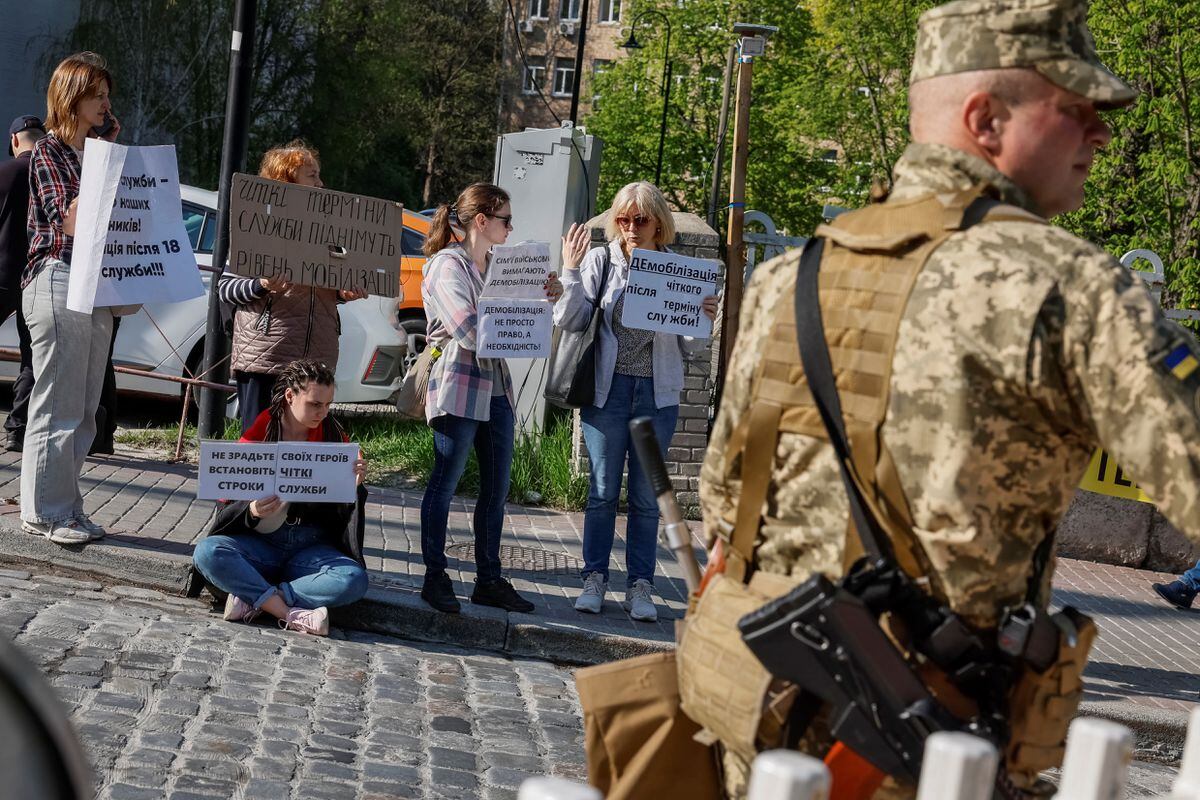 Ukraine enforces new law pressuring civilians to join military