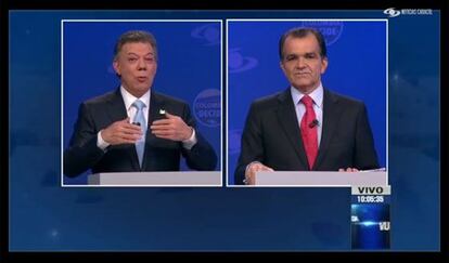 Santos y Zuluaga, durante el debate.