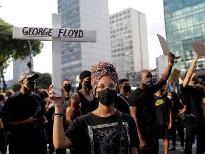 People protest against racism and hate crimes during a Black Lives Matter demonstration in Rio de Janeiro, Brazil, Sunday, June 7, 2020. (AP Photo/Silvia Izquierdo)