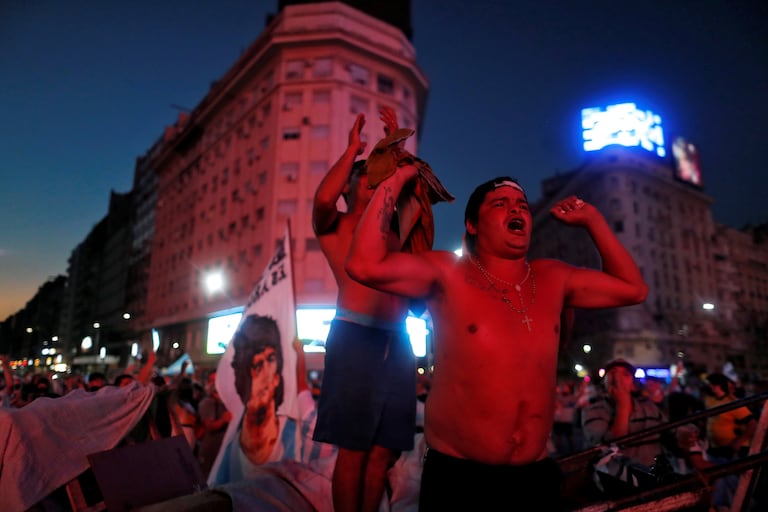 A crowd says goodbye to Maradona at the Obelisco, in Buenos Aires.