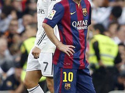 Cristiano y Messi, en un clásico del año pasado.