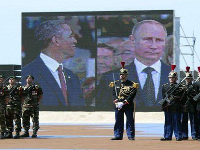Obama y Putin en la celebración del Día D. FOTO: S. LOEB (AFP) / VÍDEO: ATLAS