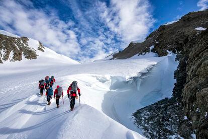 Researchers during a science project at Charles Peak, Antarctica, in December 2022.