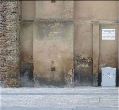 Un muro vacío es el principio de la obra de un artista callejero.