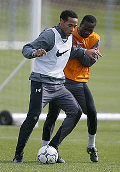 Henry y Lauren, en un entrenamiento del Arsenal.