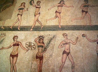 Roman athletes with bikini-like headdresses in a Sicilian mosaic.