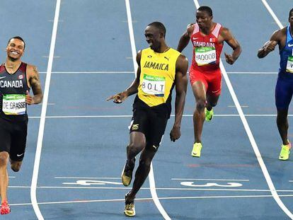 Bolt vence a De Grasse en su serie de los 200m