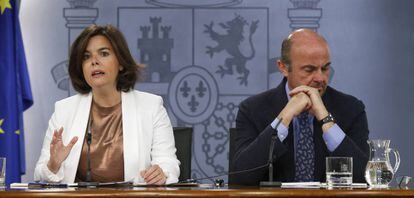 Soraya Sáenz de Santamaría y Luis de Guindos, este viernes.