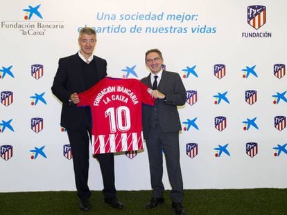 El director general de la Fundaci&oacute;n Bancaria &quot;la Caixa&quot;, Jaume Gir&oacute;, y el consejero delegado del Atl&eacute;tico de Madrid, Miguel &Aacute;ngel Gil Mar&iacute;n