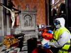 Naples (Italy), 06/03/2020.- Operators of the 'Napoli Servizi' city services fumigate the Church of San Domenico Maggiore in Naples to counteract the danger of a contagion from the coronavirus, Naples, Italy, 06 March 2020. According to official figures the number of Coronavirus cases in Italy, the center of Europe's COVID-19 outbreak, was at 3,858 cases by 06 March with a death toll of 148 people while 414 people have recovered since the outbreak. (Italia, Nápoles) EFE/EPA/CIRO FUSCO