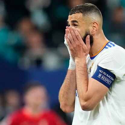 Real Madrid's Karim Benzema reacts after his goal was disallowed during the Champions League final soccer match between Liverpool and Real Madrid at the Stade de France in Saint Denis near Paris, Saturday, May 28, 2022. (AP Photo/Petr David Josek)