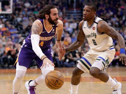 Ricky Rubio, defendido por Eric Bledsoe.