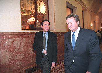 El ministro de Justicia, José María Michavila, y el portavoz del PP, Luis de Grandes, en una fotografía de archivo.