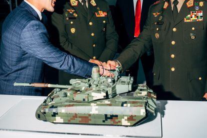 'Peruvian delegation at the UkrOboronProm stand.  The Oplot-M main battle tank as a possible solution to replace the old Soviet T 55 MBT of the Peruvian Army.  SITDEF, Lima, Peru, 2019.