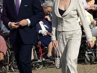 Lord Linley, con su esposa Serena.