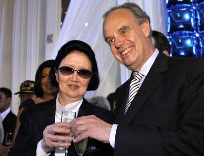 French Culture Minister Frederic Mitterrand toasts with Japanese designer Hanae Mori at a reception for France's national day on July 14, 2011, in Koriyama, Fukushima, Japan.