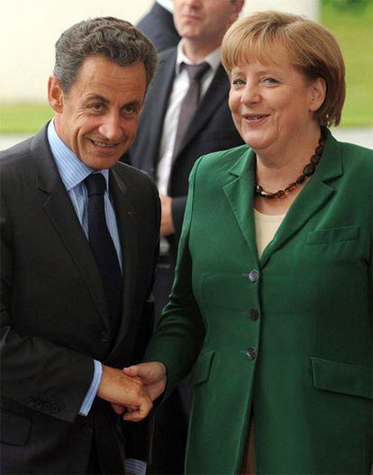 El presidente francés, Nicolás Sarkozy, con la canciller alemana, Ángela Merkel.