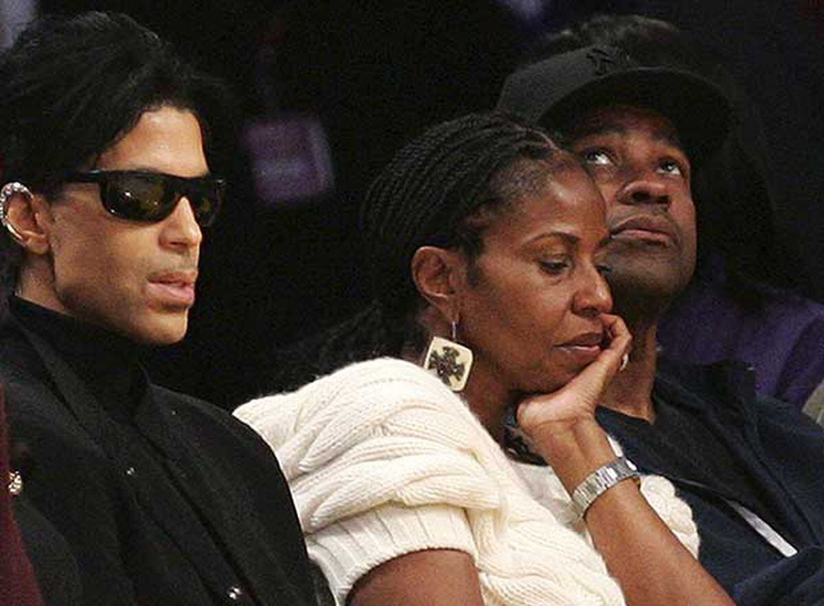 Prince y Denzel Washington, durante el par Agenda EL PAÍS