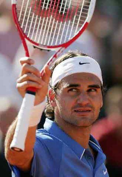 Federer celebra su triunfo sobre el croata Ancic.