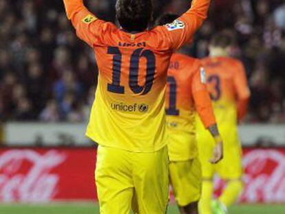 Messi celebra uno de sus goles al Granada