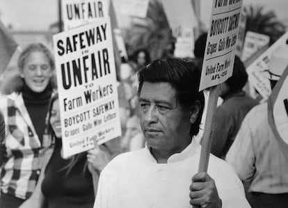 (Original Caption) Farm labor leader Cesar Chavez pickets here outside San Diego area headquarters of Safeway markets. Picketing was in protest over the arrest of 29 persons at a Delano, California Safeway. Nationwide picketing has been launched to protest arrests.