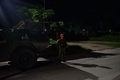 Military checkpoint in the middle of the night on a highway in Saravena. 