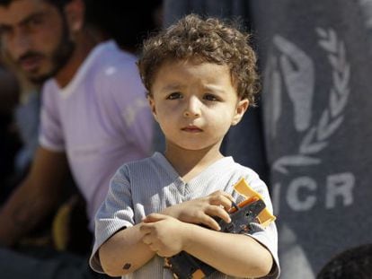 Un niño sirio en un campo de refugiados en la frontera con Jordania.
