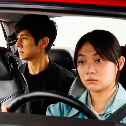 This image released by Janus Films and Sideshow shows Hidetoshi Nishijima, left, and Toko Miura in a scene from "Drive My Car." (Janus Films and Sideshow via AP)