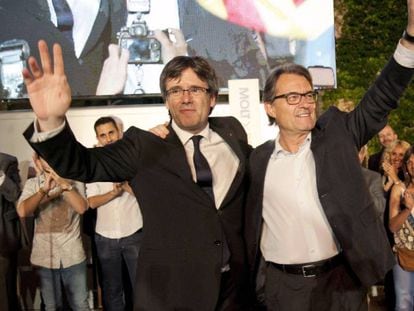 El president de la Generalitat, Carles Puigdemont, i Artur Mas, ahir a Girona.