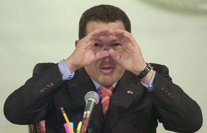 El presidente venezolano, Hugo Chávez, durante una conferencia de prensa en el palacio de Miraflores en Caracas.

 / AP