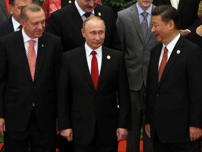 Recep Tayyip Erdogan, Vladimir Putin y Xi Jinping, durante un encuentro en China en mayo de 2017.
