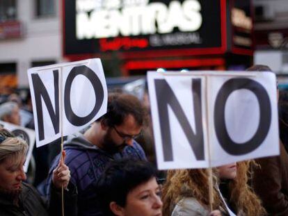 Varias personas protestan en las calles de Madrid durante una convocatoria de la Coordinadora 25-S. 