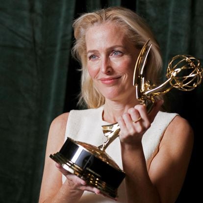 Gillian Anderson poses with her Emmy award for Outstanding Supporting Actress in a Drama Series, backstage at the Netflix UK Primetime Emmy for "The Crown", in London, Britain, September 20, 2021. REUTERS/Peter Nicholls