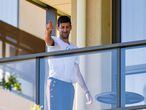 Men's world number one tennis player Novak Djokovic of Serbia gestures from his hotel balcony in Adelaide on January 18, 2021, one of the locations where players have quarantined for two weeks upon their arrival ahead of the Australian Open tennis tournament in Melbourne. (Photo by Brenton EDWARDS / AFP) / -- IMAGE RESTRICTED TO EDITORIAL USE - STRICTLY NO COMMERCIAL USE --