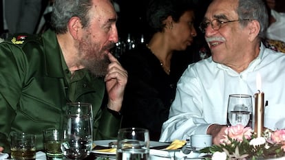 FILE - In this March 3, 2000 file photo, Cuba's leader Fidel Castro, left, and Colombian Nobel laureate Gabriel Garcia Marquez speak during a dinner at the annual cigar festival in Havana, Cuba. Marquez died on Thursday, April 17, 2014 at his home in Mexico City. (AP Photo/Jose Goitia, File)
