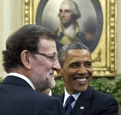 El presidente del Gobierno español, Mariano Rajoy (i), y el presidente de Estados Unidos, Barack Obama, momentos antes de la reunión que ambos han mantenido hoy en la Casa Blanca, en Washington, el 13 de enero de 2014.