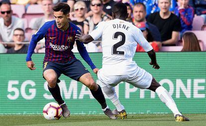 Coutinho frente a Dakonam, en el Barcelona-Getafe.  