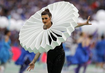 An artist performs during the opening ceremony of the Euro 2016 championship, prior to the Group A soccer match between France and Romania, at the Stade de France, in Saint-Denis, north of Paris, Friday, June 10, 2016. (AP Photo/Frank Augstein)