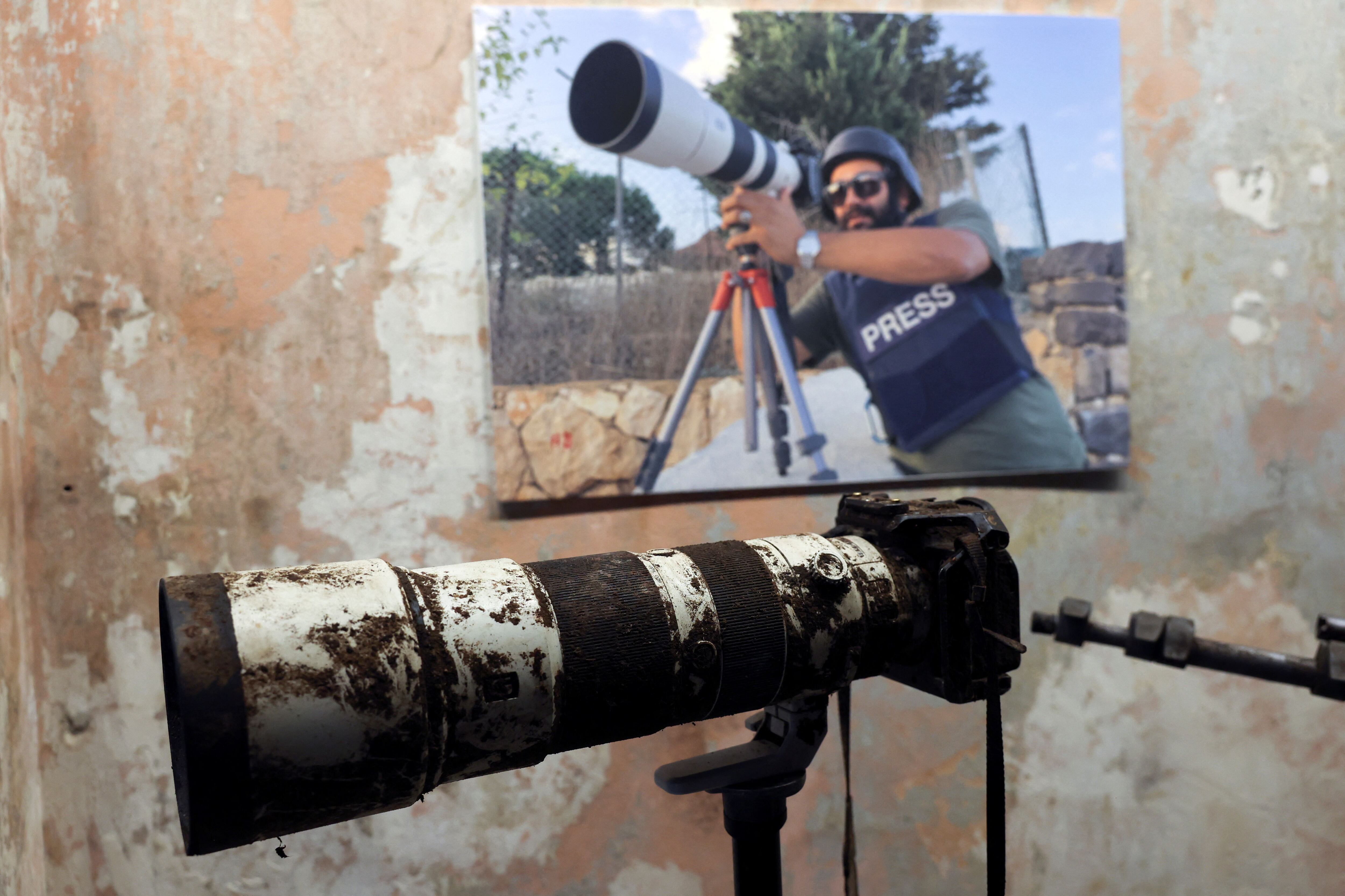 The camera that belonged to Reuters journalist Issam Abdallah who was killed on October 13 by what a Reuters investigation has found was an Israeli tank crew, is displayed during a press conference by Amnesty International and Human Rights Watch as they released findings from their investigations into the deadly October 13 strikes by Israel on southern Lebanon, in Beirut, Lebanon, December 7, 2023. REUTERS/Emilie Madi