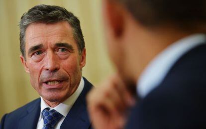 El secretario general de la OTAN, Anders Fogh Rasmussen, en conversaci&oacute;n con Obama.