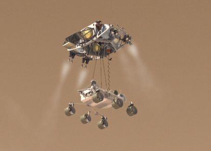 Ilustración de la última fase de descenso del futuro vehiculo 'Curiosity' en la superficie de Marte